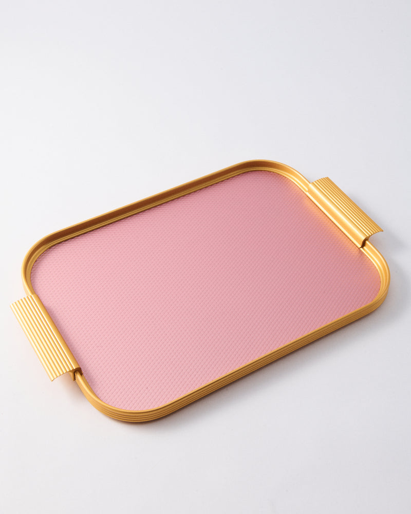 Small pink and gold anodised aluminium drink tray with ribbed edges and built-in handles, photographed on a clean white background